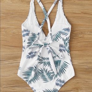Tropical one piece bathing suit.